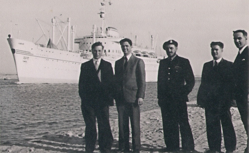 Herbert 'Bert' Mills, centre,  and RAF colleagues on the Suez canal.jpg